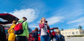Firefighters return with refugees