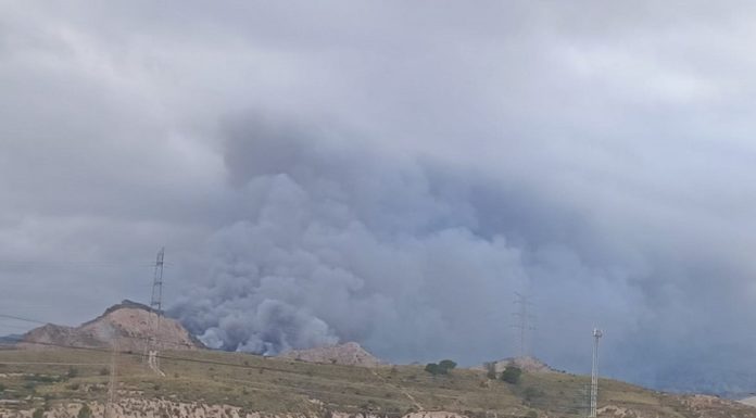 Rubbish tip fire still burning