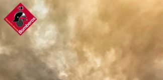 Fire relents as the heavens open